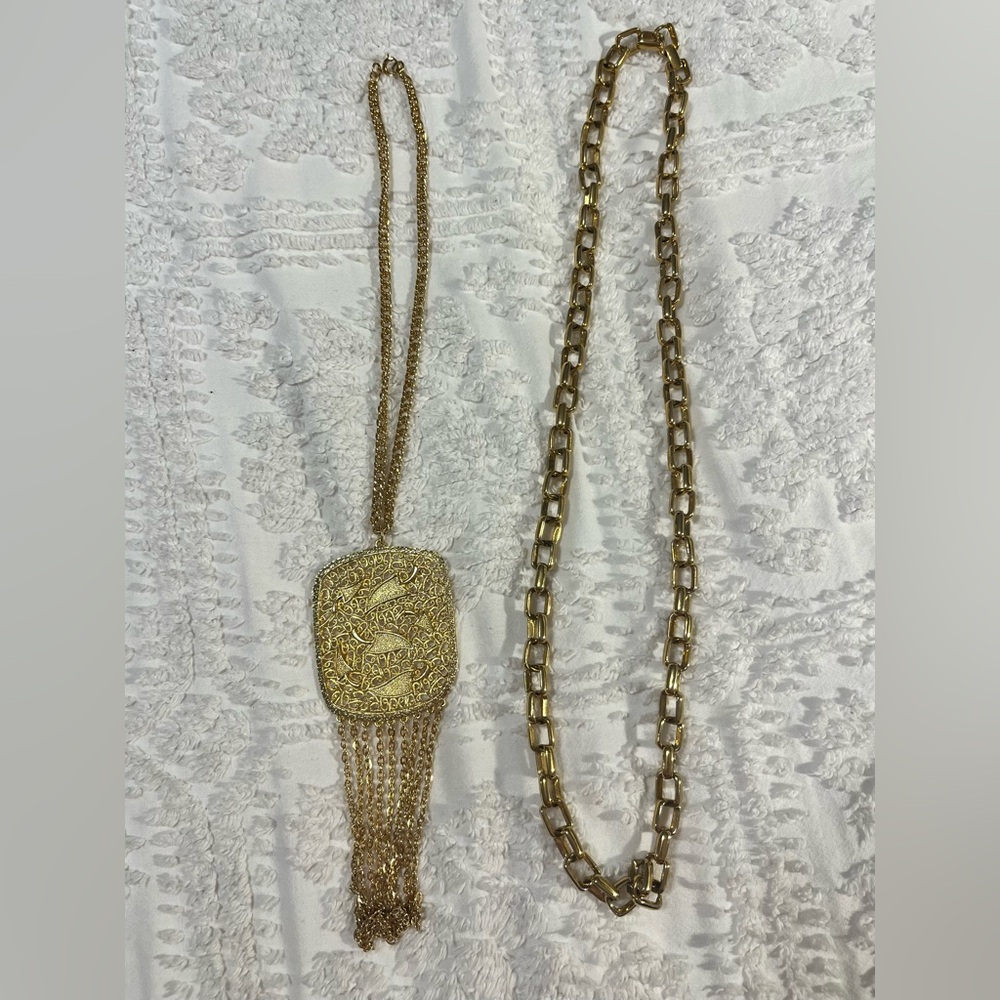 Heavy, gold tone chain necklace plus large medallion necklace gold tone